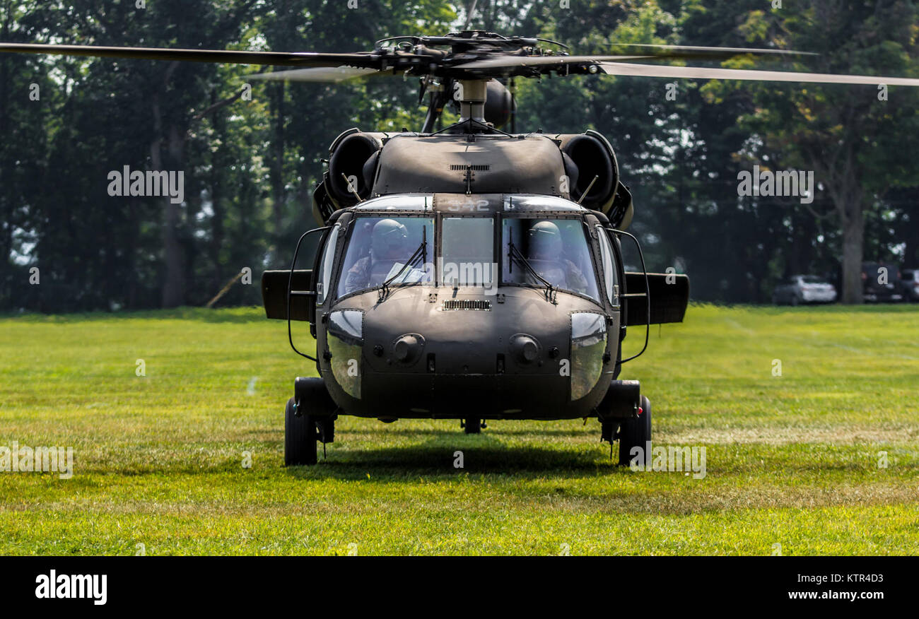 Civilian employers of New York Army National Guard Soldiers leave on UH-60 Blackhawks operated by A Co., 3rd Battalion, 142nd Assault Helicopter Battalion, at the conclusion of a &quot;Boss Lift&quot;  at Camp Smith, N.Y., Sept. 10, 2016.  The Boss Lift program, run by the Employer Support of the Guard and Reserve (ESGR), invites employers from companies that employ National Guardsmen, or prospective employers, to spend a day working with Soldiers to understand what their employees' drill weekends and service entails. (U.S. Army National Guard photo by Sgt. Harley Jelis) Stock Photo