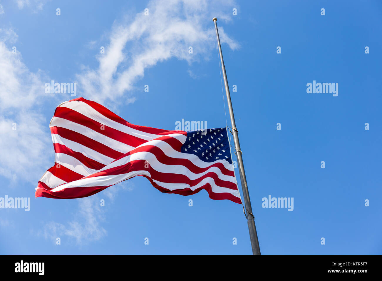 United States flag flying at a halfstaff Stock Photo Alamy