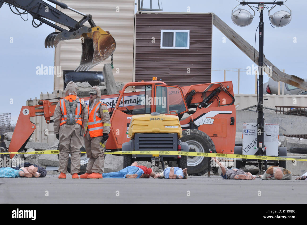 ORISKANY, N.Y. Soldiers dressed in chemical protection suits stage in