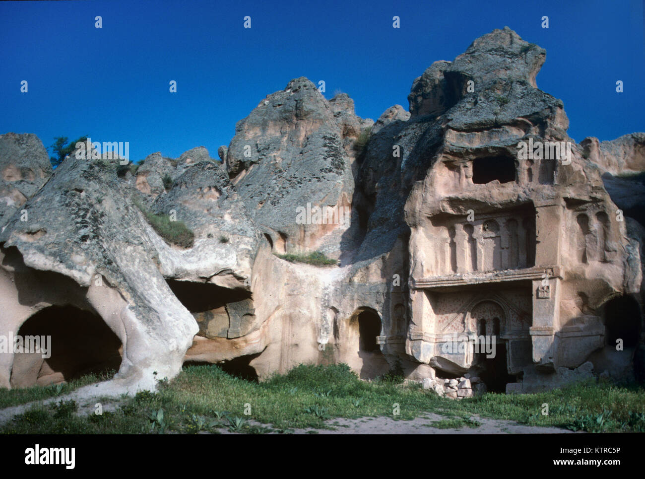 Troglodyte Complex of Cave Houses and a Byzantine Rock-Cut Monastery, known as the Open Palace, Carved Out of Soft Volcanic Tuff Rock near Gulsehir, ,Cappadocia, Turkey Stock Photo
