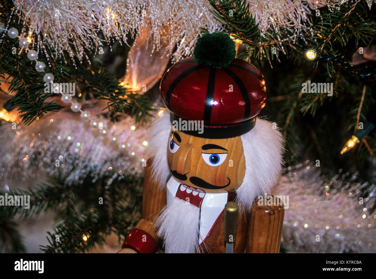 Vintage Christmas Nutcrackers soldier under a Christmas tree lights