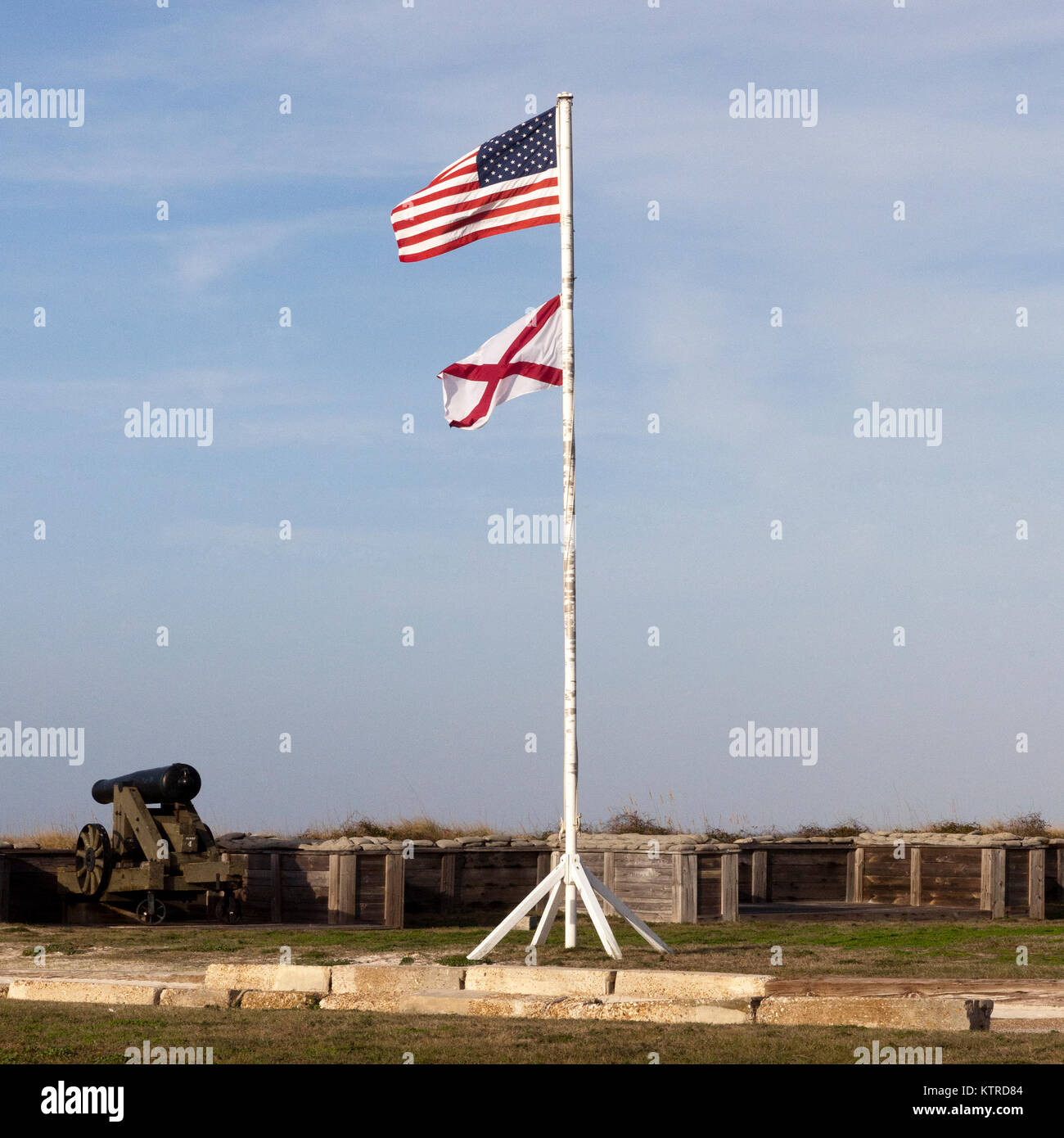United States flag and the Alabama state flag at national historic landmark Fort Morgan, Alabama Stock Photo