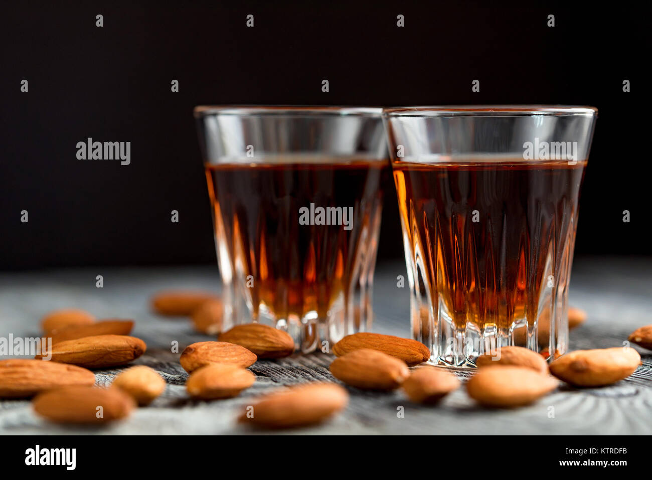Italian amaretto liqueur with dry almonds Stock Photo Alamy