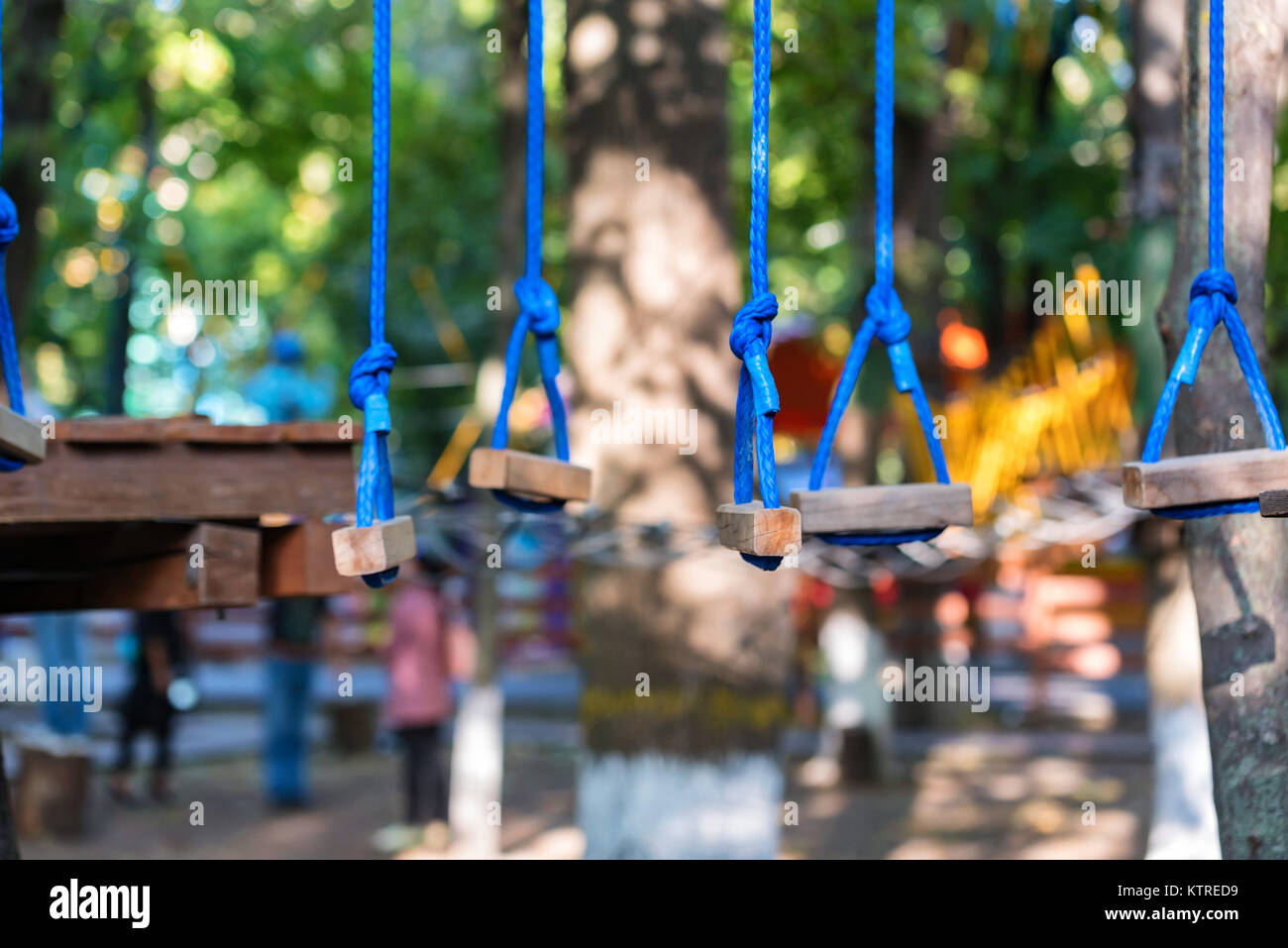 Adventure park ropes for climbing Stock Photo - Alamy