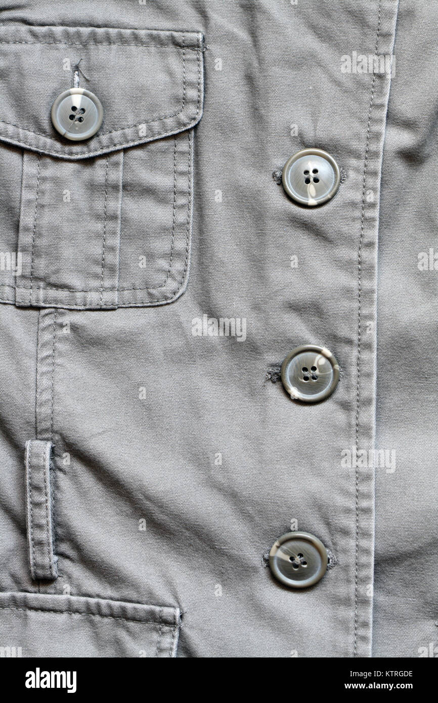 Extreme closeup of khaki jacket with buttons and pocket Stock Photo Alamy