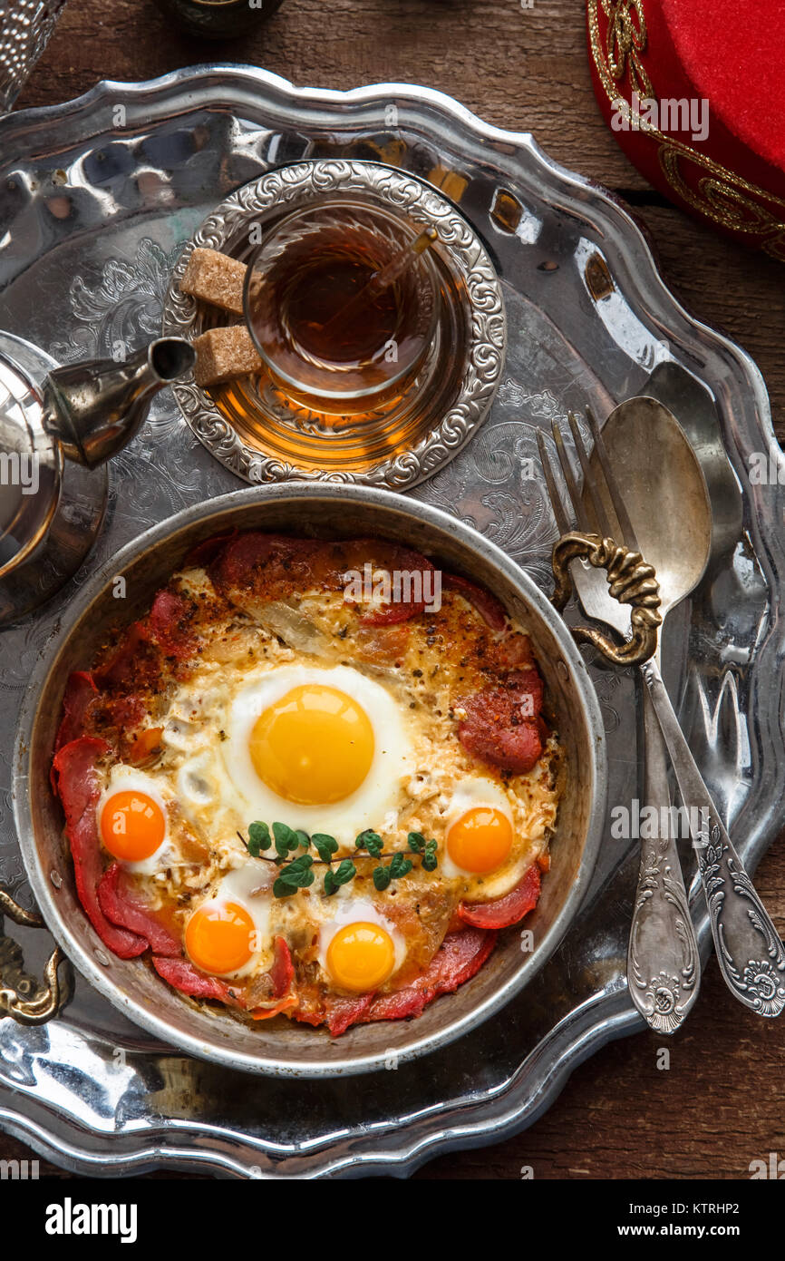 Turkish cured beef and fried eggs in copper pan, traditional breakfast, top view Stock Photo Alamy
