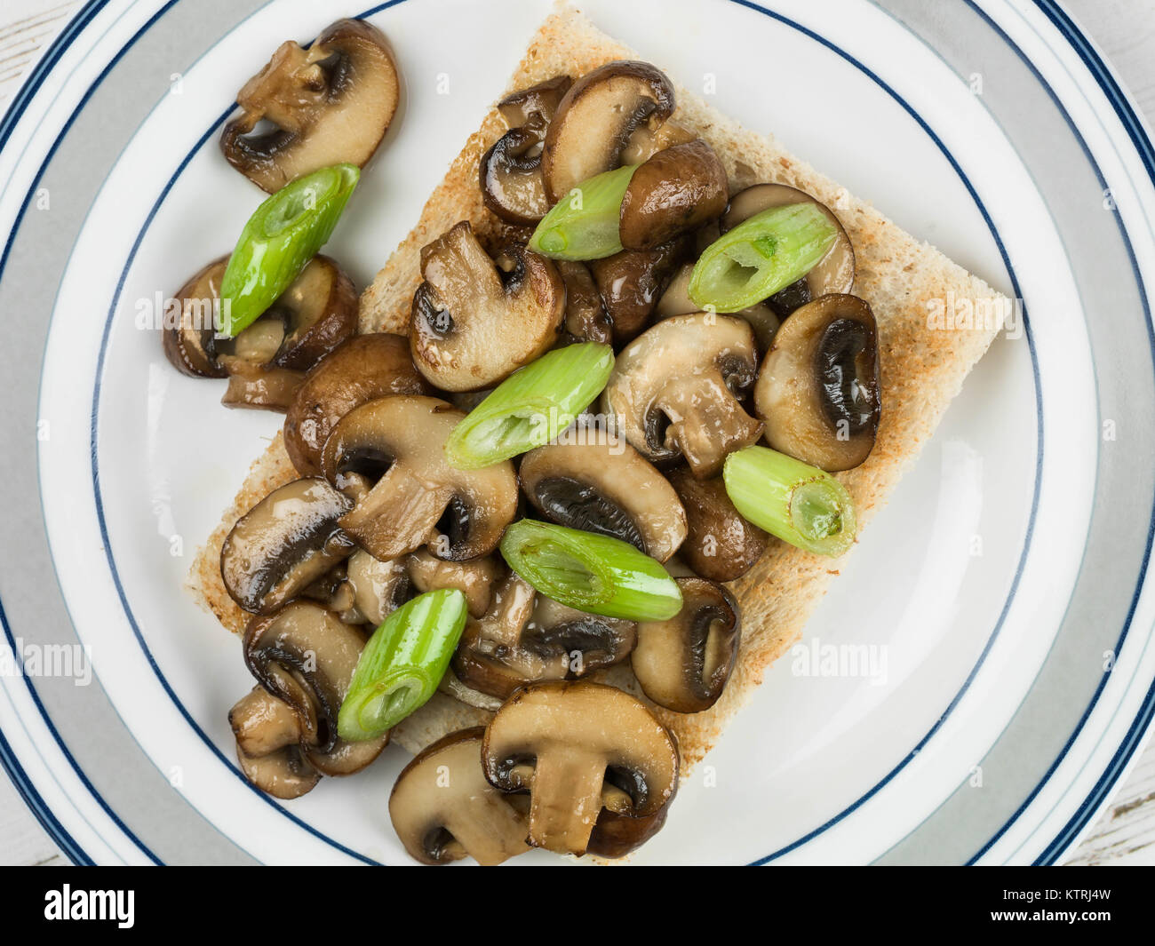 Fried Mushrooms and Spring Onions on Toast Stock Photo Alamy