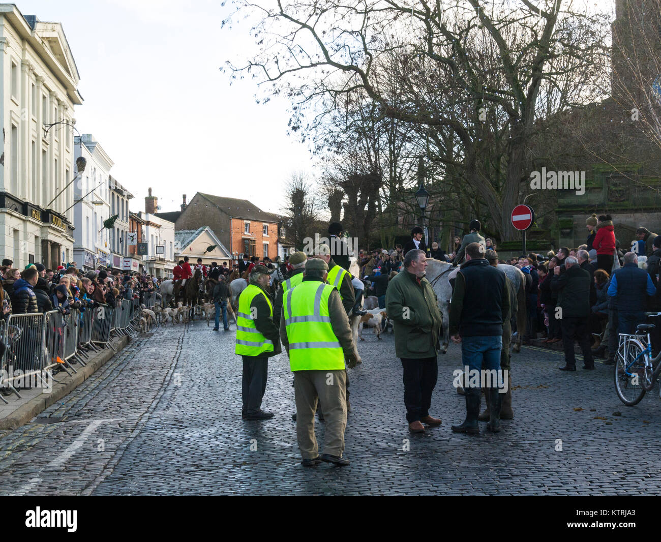 Crowds gathered in St Mary's Street in Newport Shropshire England UK for Albrighton and Woodland Hunt's traditional annual Boxing Day gathering Stock Photo