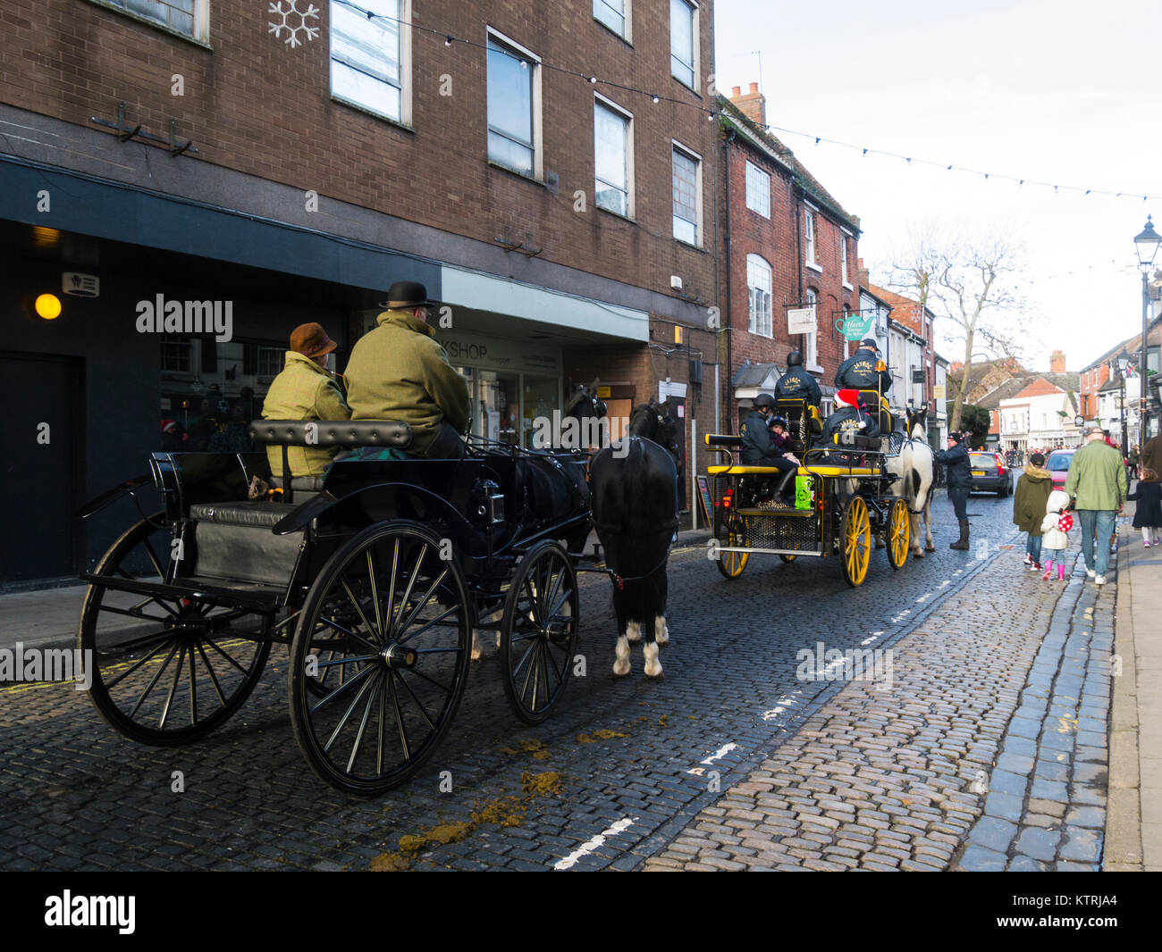 Horse drawn Carriages waiting in St Mary's Street Newport Shropshire England UK taking part in Albrighton and Woodland Hunt Boxing Day gathering Stock Photo