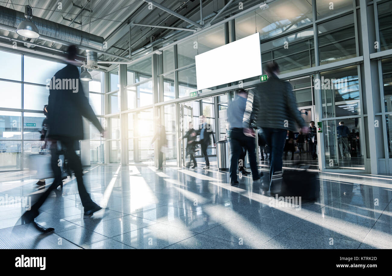Blurred business people walking at a entrance Stock Photo - Alamy