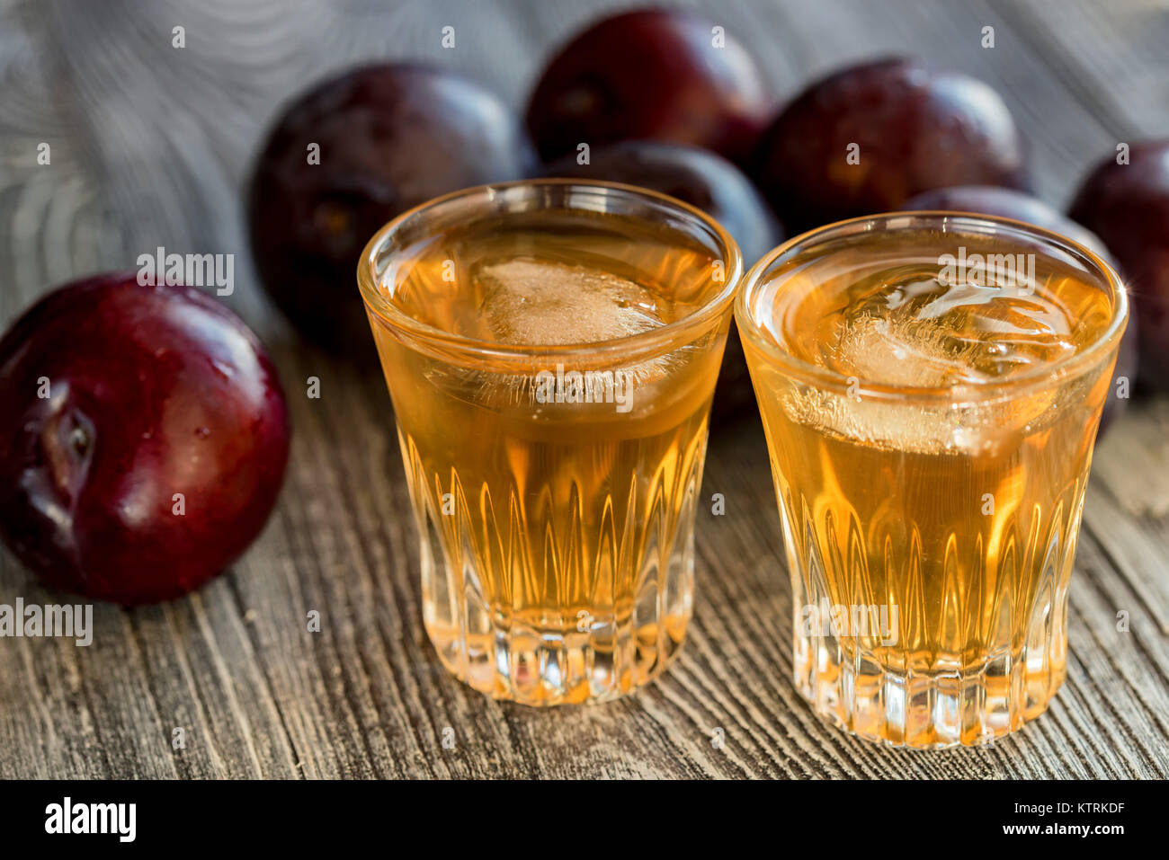 Plum brandy or slivovitz with fresh and tasty plum Stock Photo Alamy