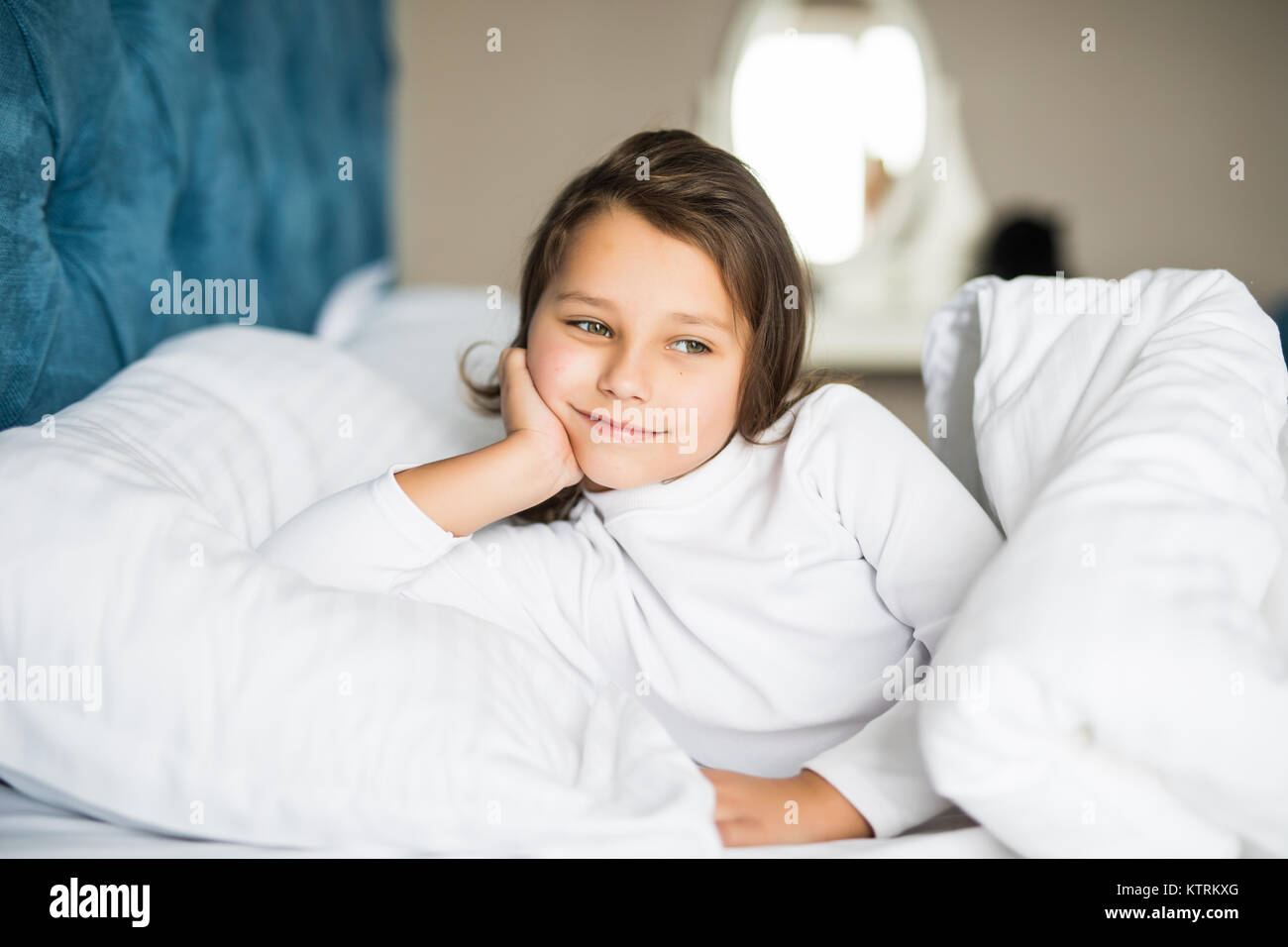 Sweet little girl is sleeping in her bed at home, close up Stock Photo ...