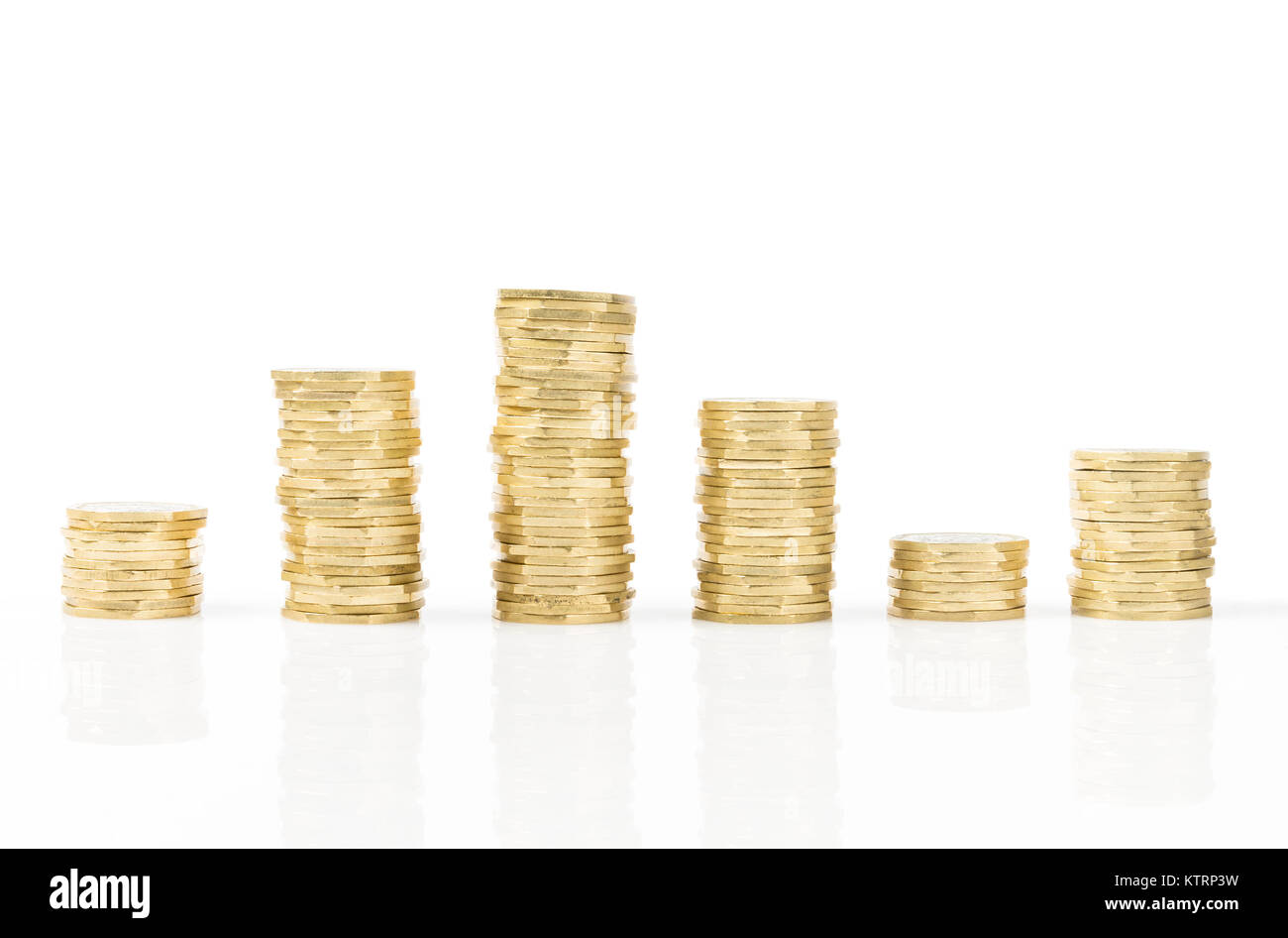 Golden Coins stack up and down scale isolated on white background Stock Photo