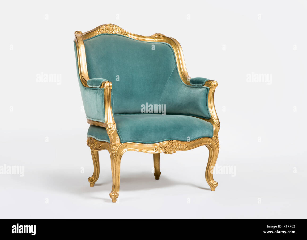 Golden and light blue classic armchair isolated on white background Stock Photo