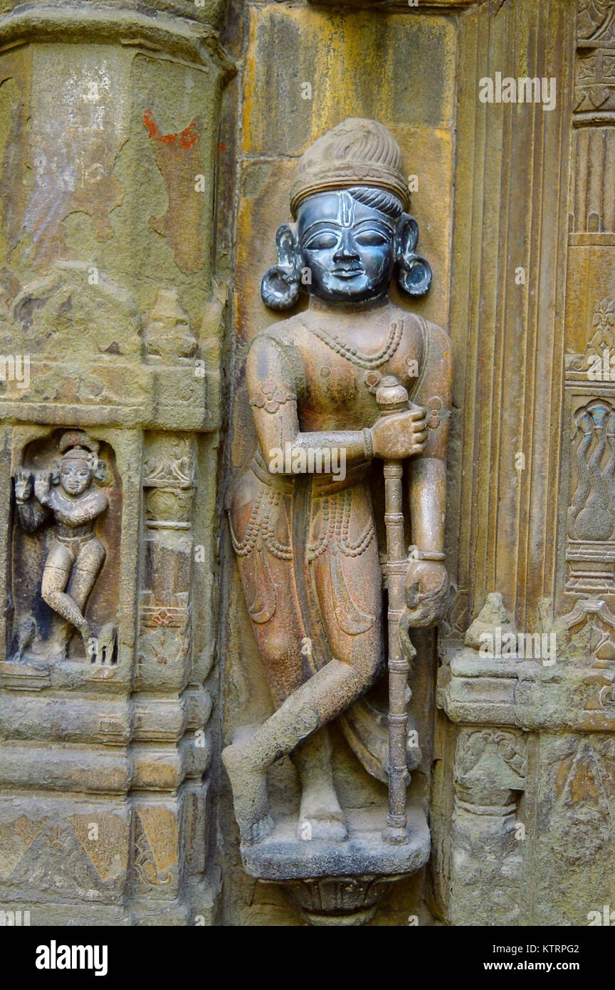 Sculpture of dwarpala on the wall of Trishund Mayureshshwar Ganesh Temple at Somawar Peth Pune Maharashtra India Stock Photo