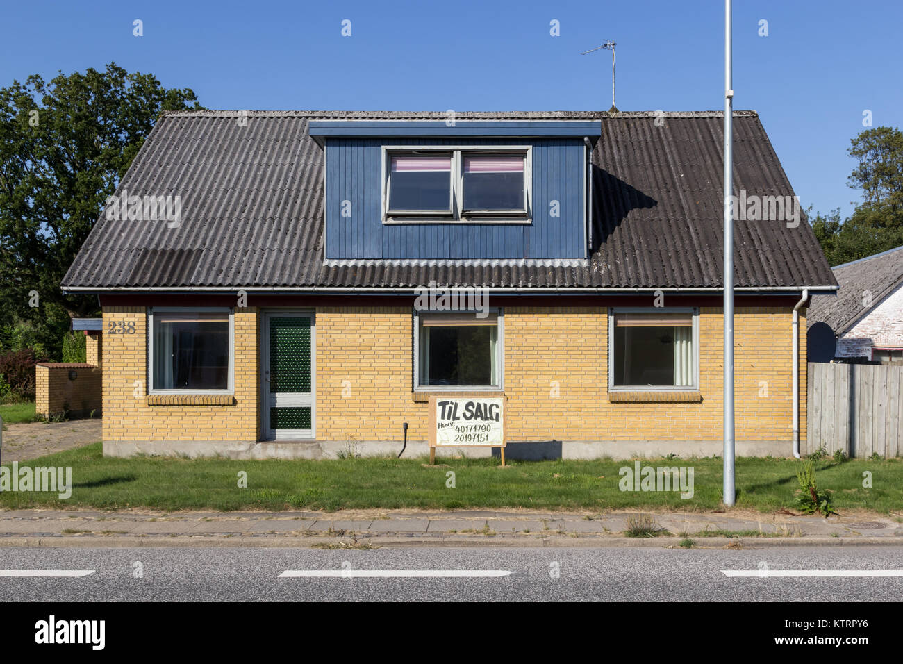 Vacant house in small village; Thorshoej, Vendsyssel, Denmark Stock