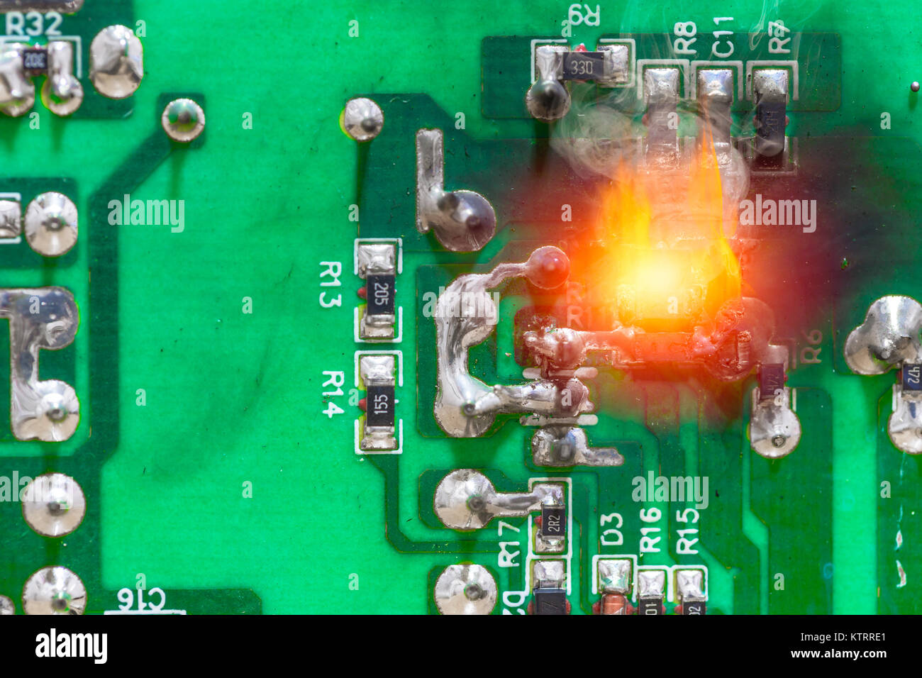 PCB circuit board electricity short circuit fire and burning Stock Photo