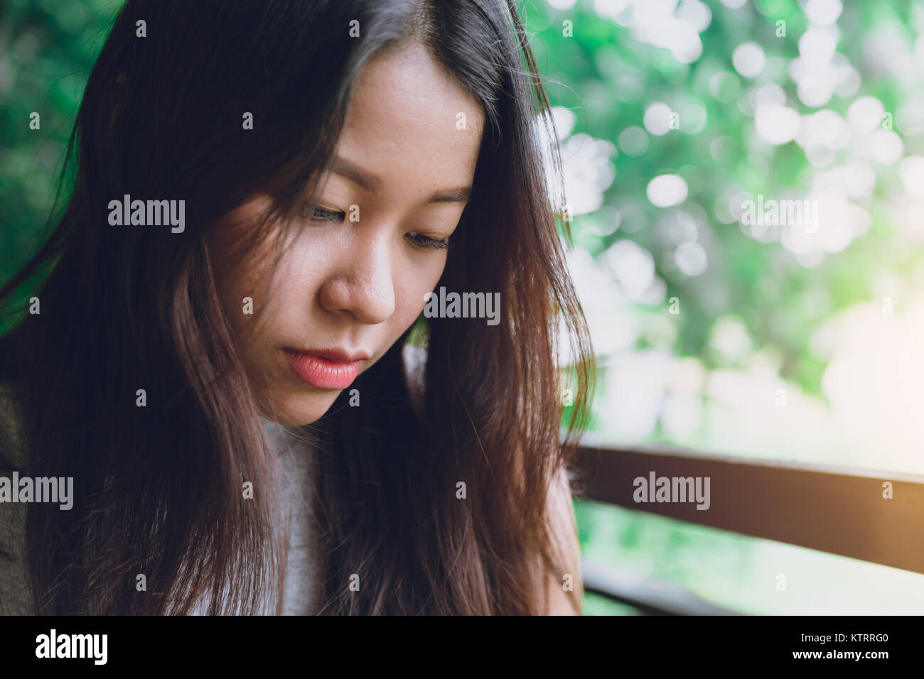 sad still mood of Asian women portrait closeup face with space for text Stock Photo