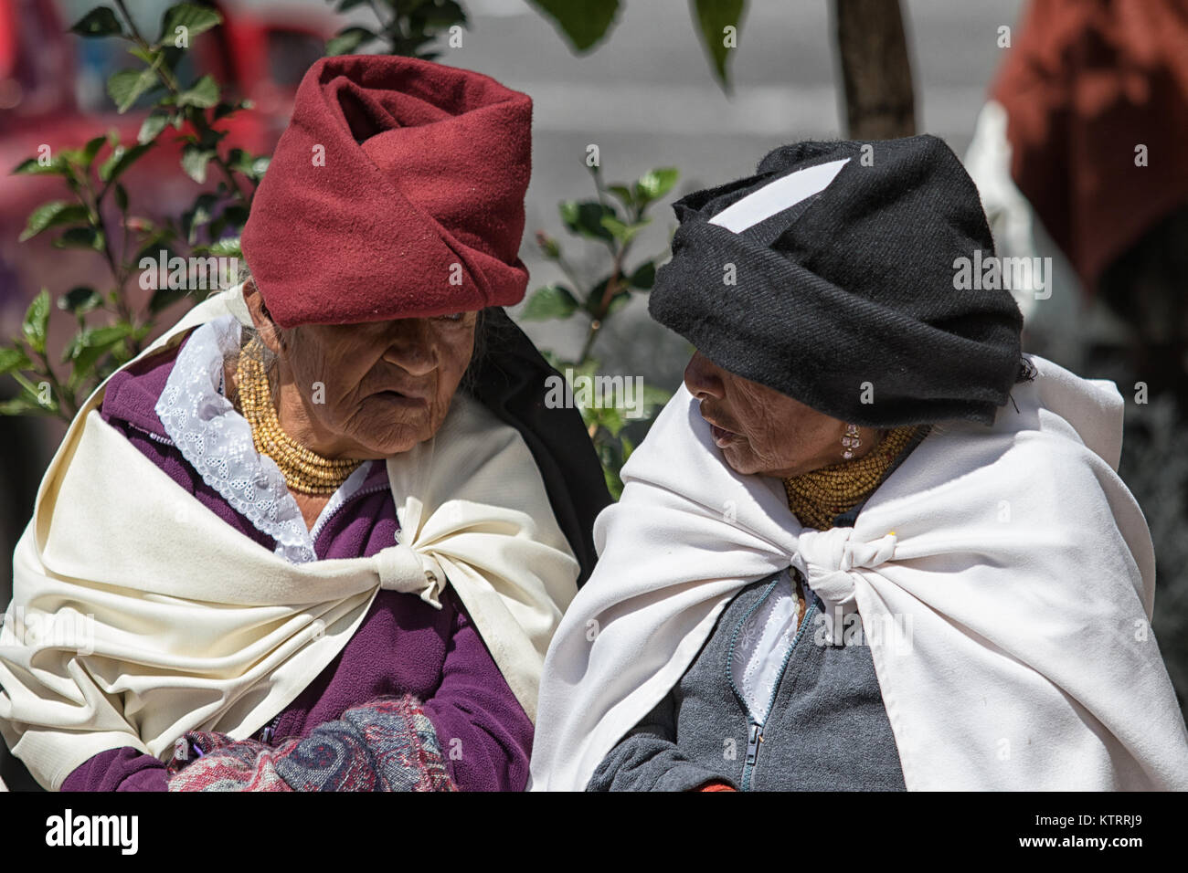 Otavalo, Ecuador-December 23, 2017: idigenous women talking to each-other outdoors Stock Photo