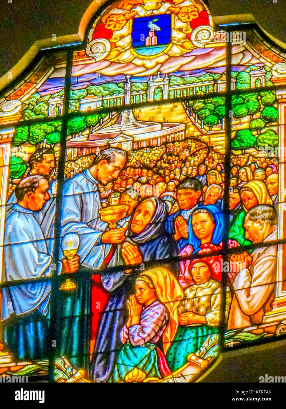 Mass Three Peasant Children Stained Glass Basilica of Lady of Rosary Fatima Portugal. Church created on site where three Portuguese Shepherd children  Stock Photo