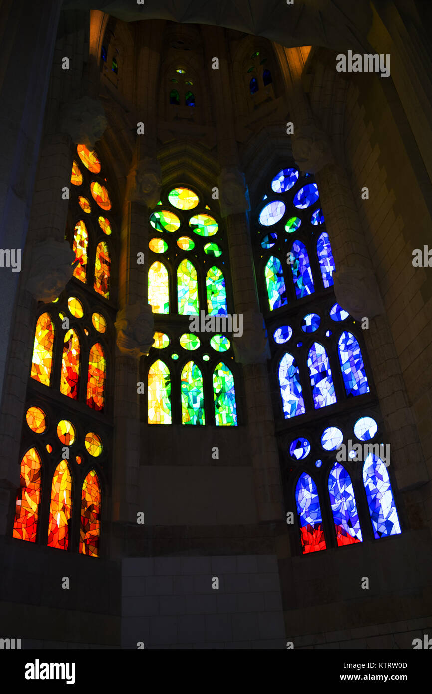 Different color stained glass windows of Sagrada Familia Stock Photo