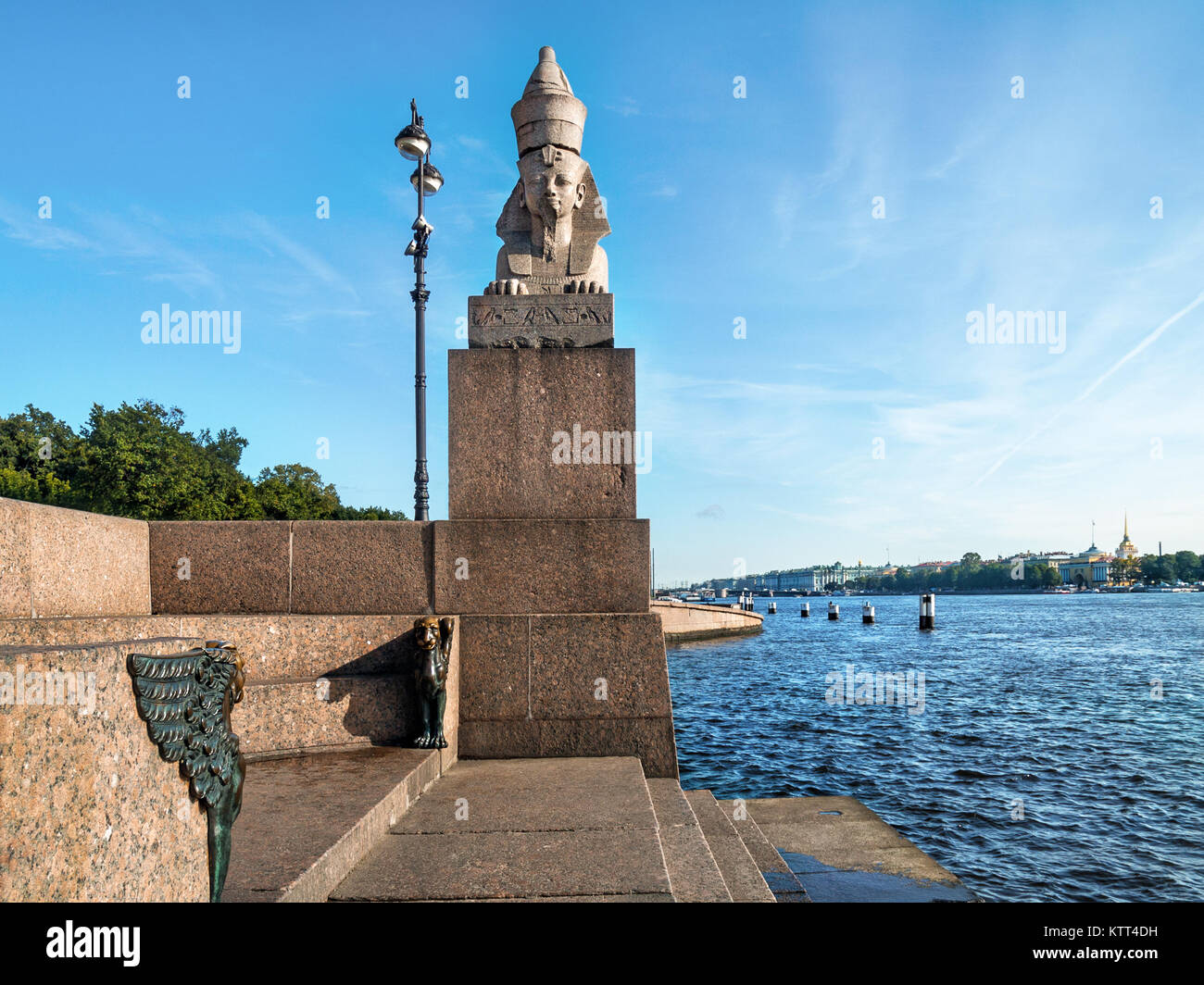 Sphinx on the pedestal and griffins on the granite embankment of the Neva River on the Vasilievsky Island in the city of St. Petersburg in Russia in s Stock Photo
