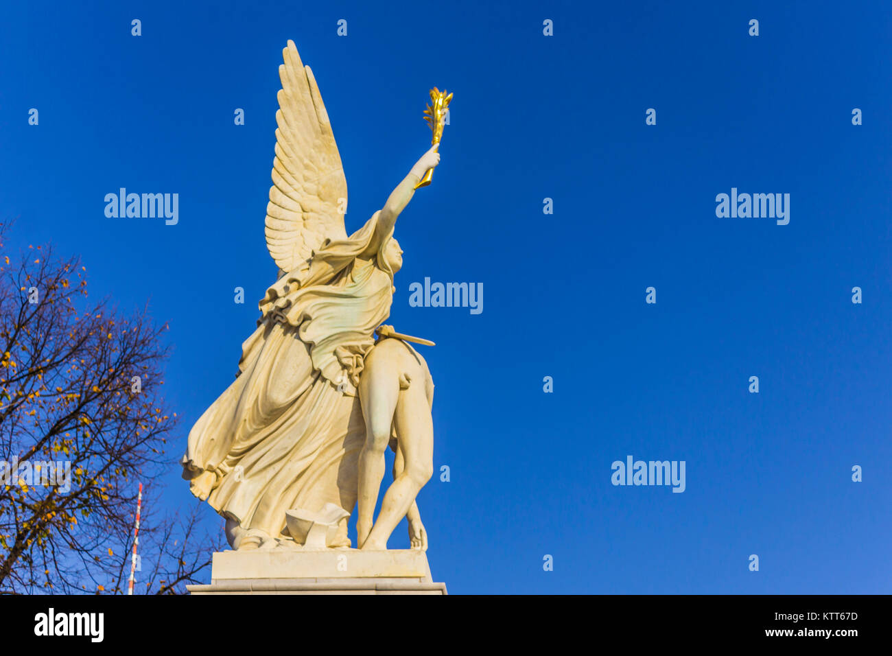 Nike Takes the Fallen Hero to Olympus. Allegorical sculpture on a  Schlossbrucke bridge . Blue sky and white marble. Berlin , Germany Stock  Photo - Alamy