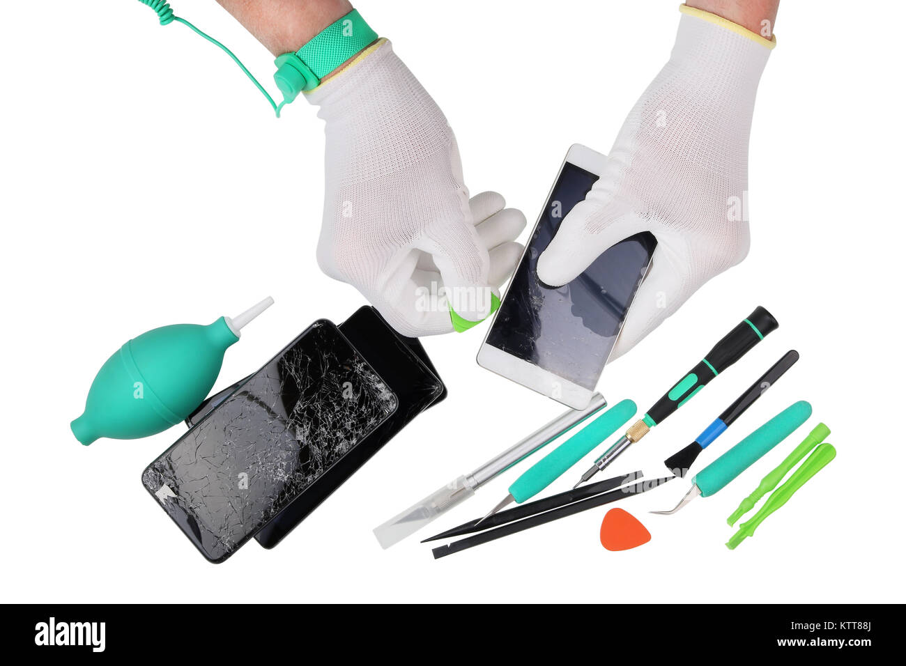 Professional repair of the  modern phones in the european service center. Technican uses the ESD antistatic gloves and wristband. Isolated with patch  Stock Photo