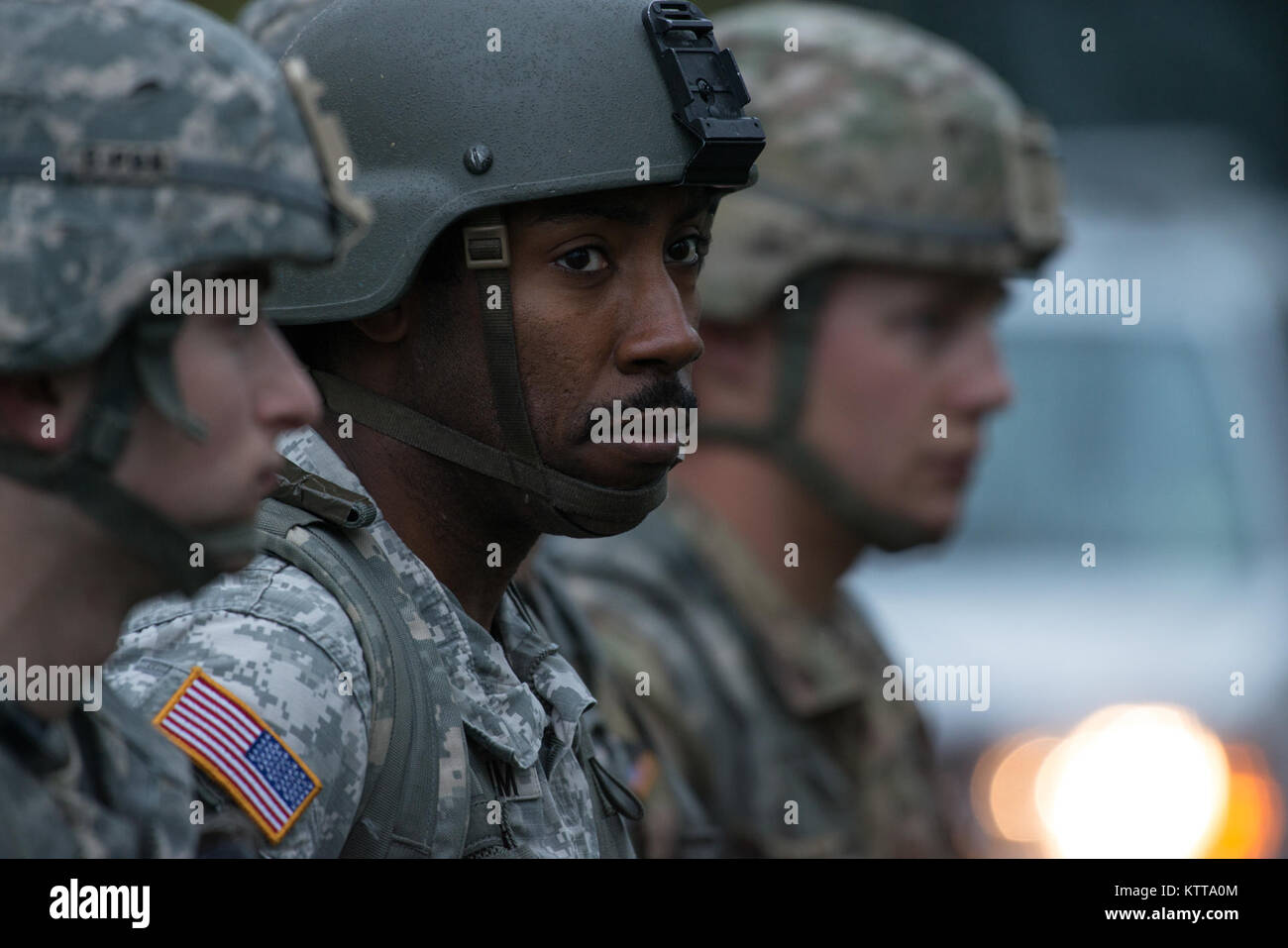 New Jersey Army National Guard soldier Sergeant Daniel Beachum listens ...