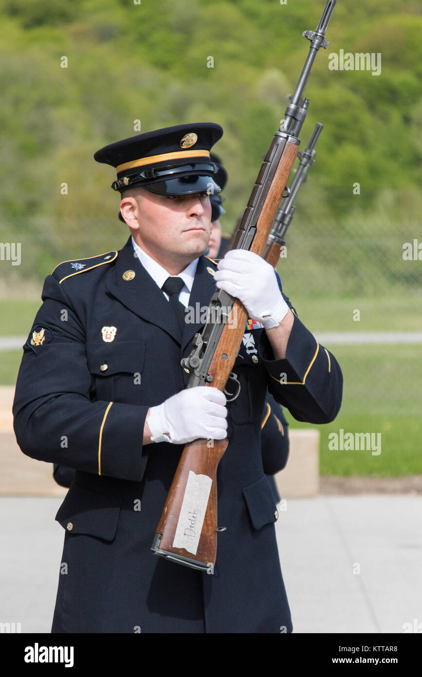 Army Spc. Stephen Drolet, a Soldier in the Massachusetts National Guard,  takes aim with a rifle during the 80-hour, Train-the-trainer Military  Funeral Honors course at Camp Smith Training Site May 11, 2017.