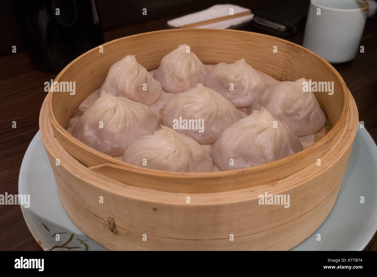 chinese steam bun xiao lun bao in a bamboo basket Stock Photo