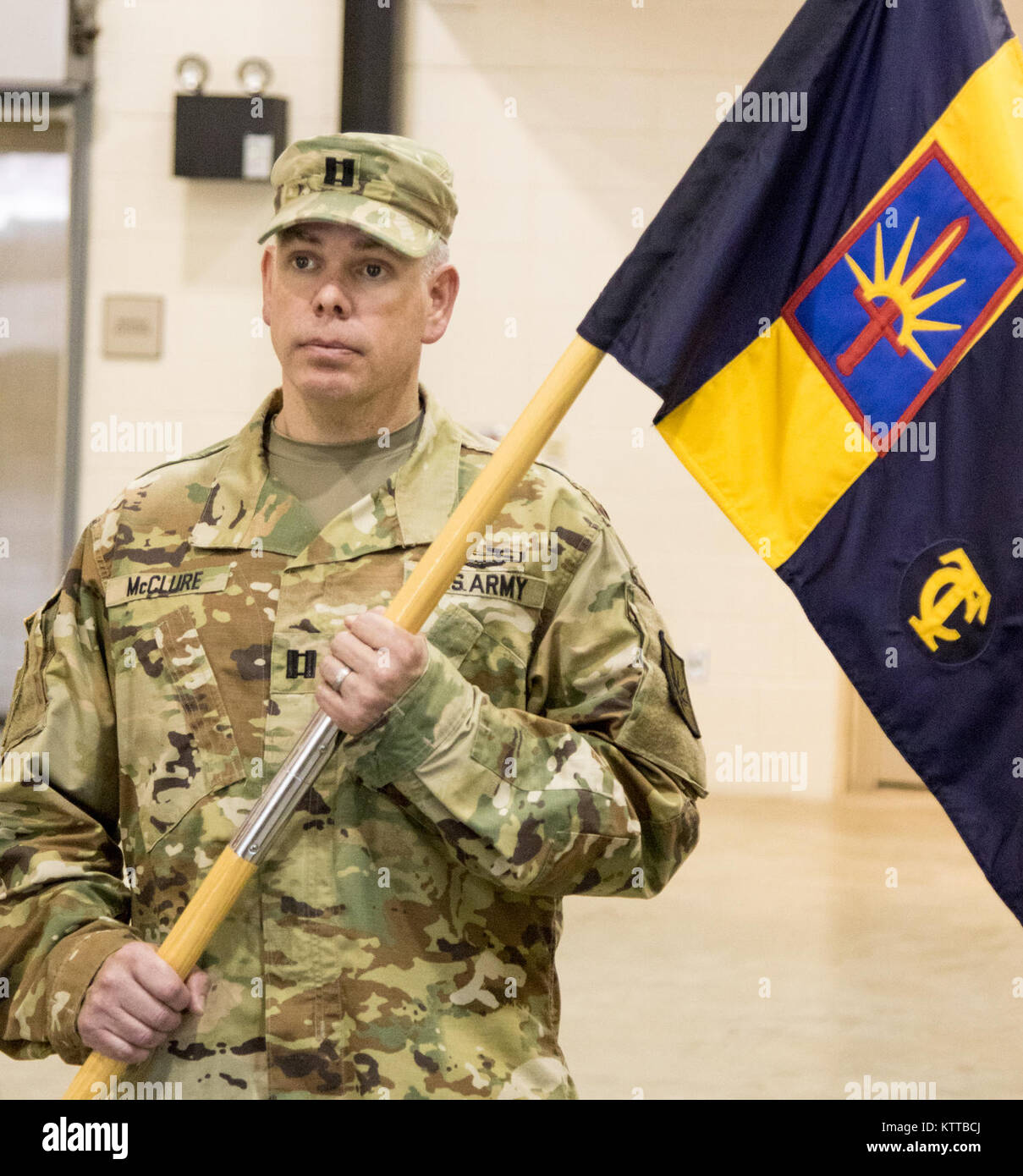 U.S. Army Cpt. Andrew S. Mcclure, the deputy G4, 53d Troop Command, New York Army National Guard, takes command of the 53d Headquarters Headquarters Detachment during a ceremony at Camp Smith June 1, 2017. (U.S. Army National Guard photo by Staff Sgt. Michael Davis) Stock Photo