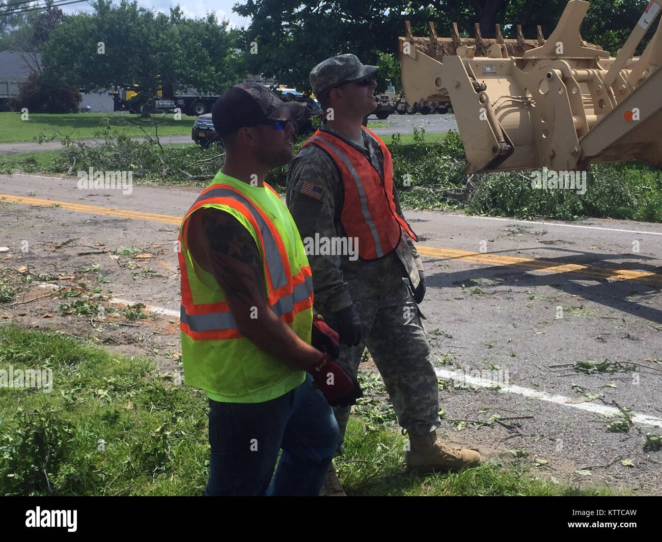 New York Army National Guard Spc. Michael Shimburski supervises debris