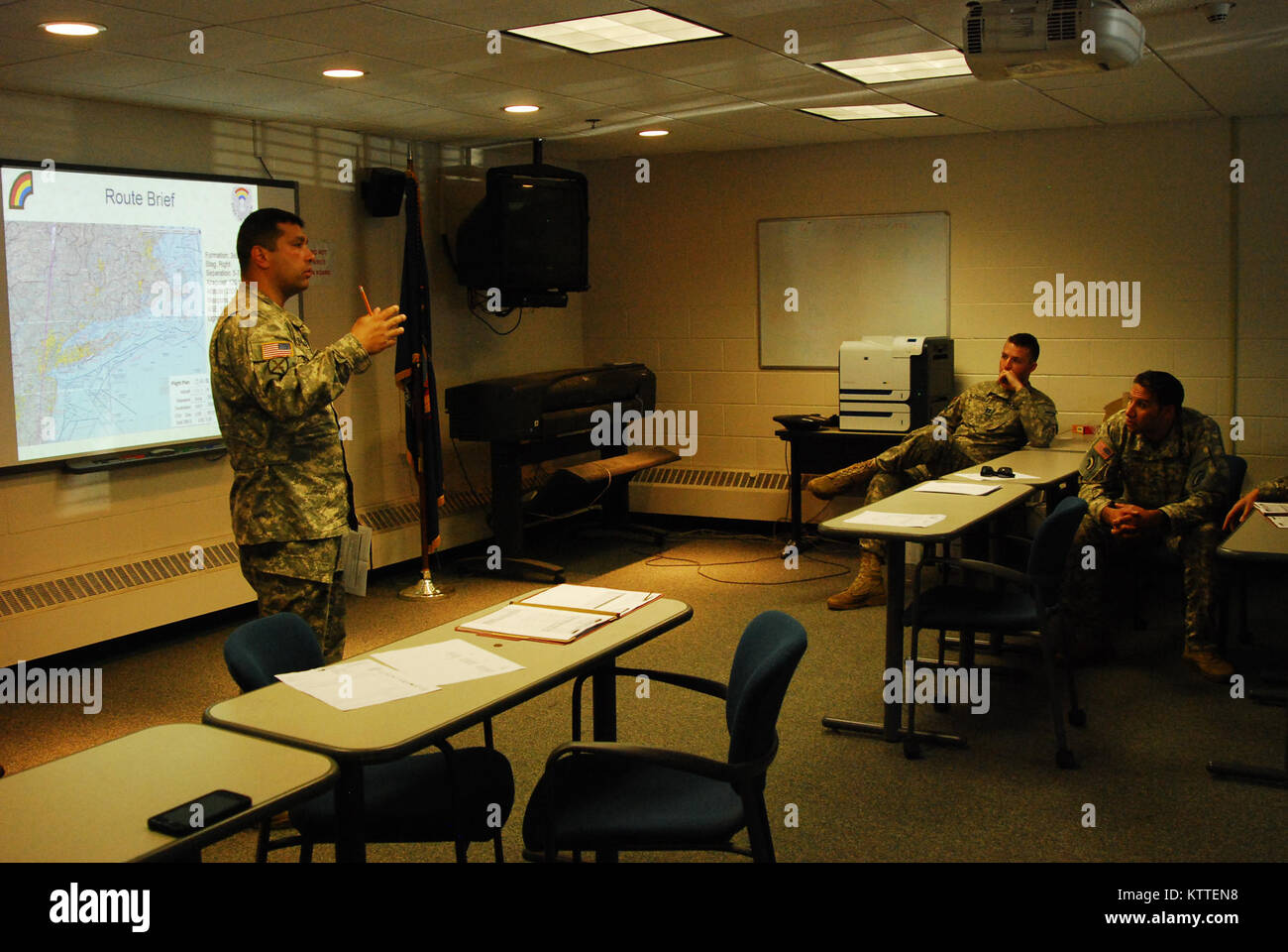 N.Y. Army National Guard Soldiers assigned to 3rd Battalion, 142nd Aviation receive a briefing on their upcoming mission in Latham, N.Y., Sept 10, 2017. The 3rd Battalion, 142nd Aviation was preparing to deploy to Florida to bring aid to the victims of Hurricane Irma. (U.S. Army National Guard photo by Pfc. Andrew Valenza) Stock Photo