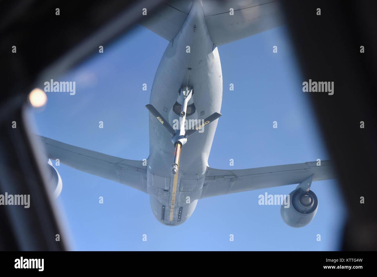 A KC-135 Stratotanker from the 171st Air Refueling Wing prepares to refuel a C-17 Globemaster from the 105th Airlift Wing during a flight for the spouses of 105th Airlift Wing members at Stewart Air National Guard Base on October 14, 2017. (U.S. National Guard photo by Master Sgt. Lee C. Guagenti) Stock Photo