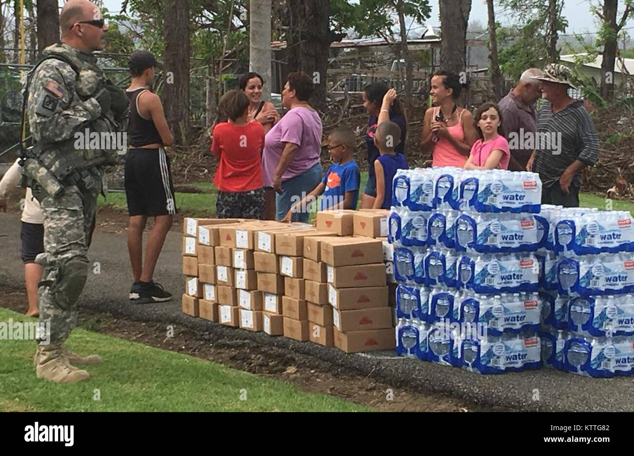 Food and water ready for distribution during a relief supply mission conducted by the 3rd Battalion, 142nd Aviation of the New York Army National Guard in Puerto Rico on Oct. 17, 2017.The 3rd Battalion 142nd Aviation has deployed 60 Army National Guard Soldiers and four UH-60 Blackhawk helicopters to Puerto Rico to assist in the island's recovery from Hurricane Maria. Stock Photo