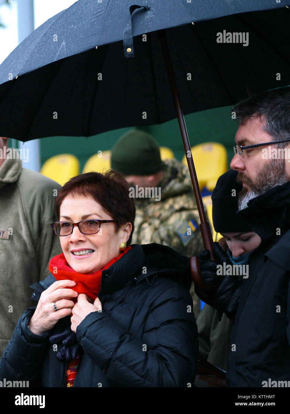 Yavoriv, Ukraine – Marie Yovanovitch, the United States Ambassador to Ukraine attends a Ukrainian Armed Forces Day ceremony at the Yavoriv Combat Training Center, Dec. 6. During the ceremony the United States presented the Ukrainian Ministry of Defense with 40 military ambulances. Stock Photo