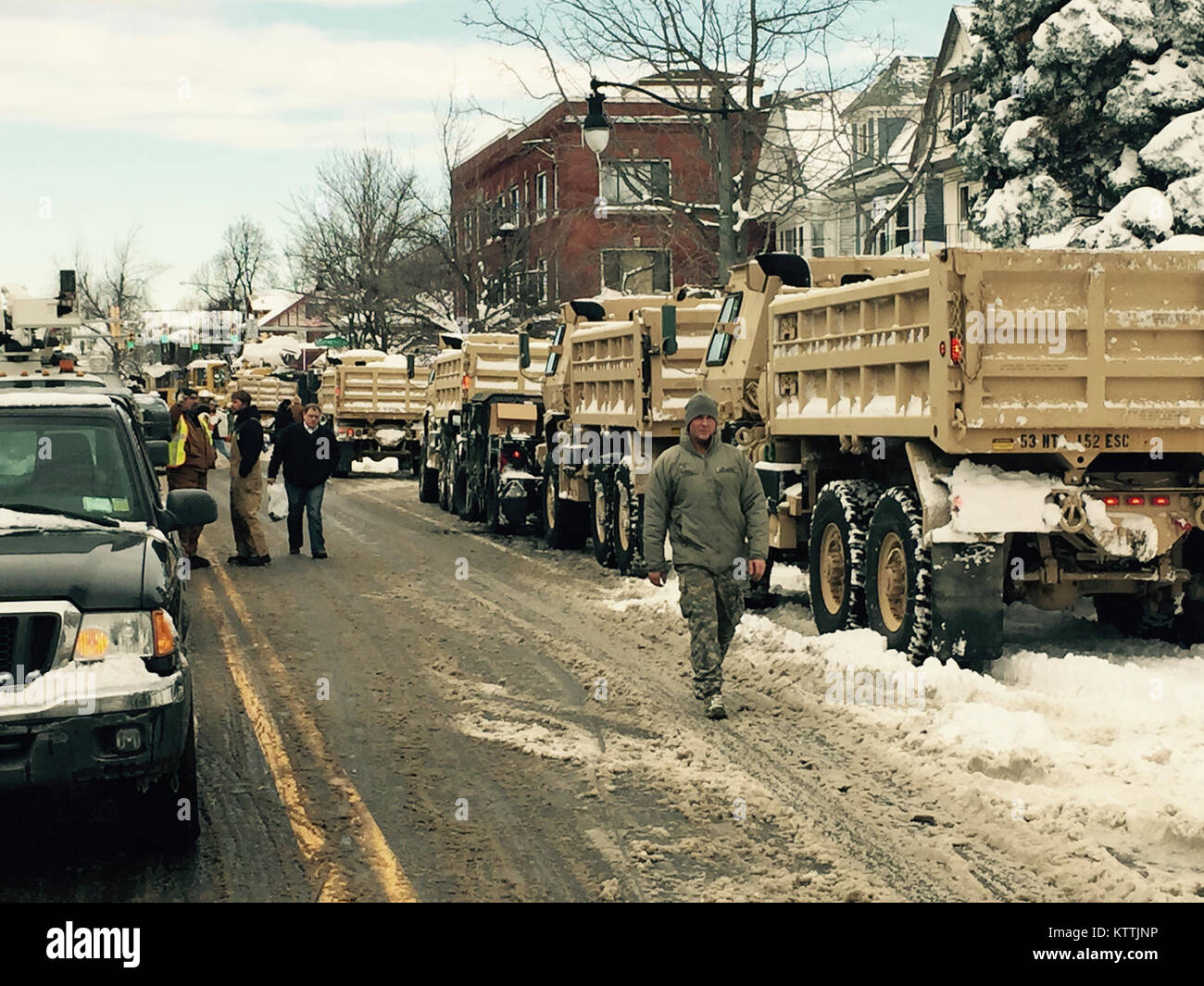 terrorisme værksted Målestok BUFFALO- A line of New York Army National Guard dump truck lines up on West  Seneca Street in Buffalo as Soldiers assigned to the 152nd Engineer Company  clear snow from the roadway