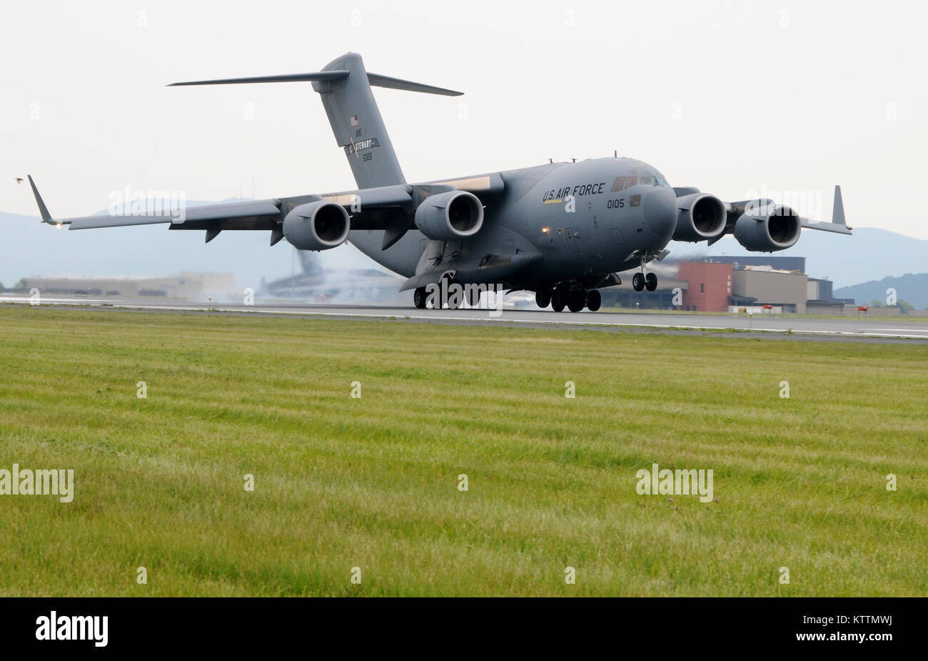 STERWART ANGB, N.Y. - The first C-17 Globemaster III, tail 5105, assigned to the 105th Airlift Wing touches down on Stewart International Airport's runway on July 18, 2011. (U.S. Air Force Photo by Tech. Sgt. Michael OHalloran) (Released) Stock Photo