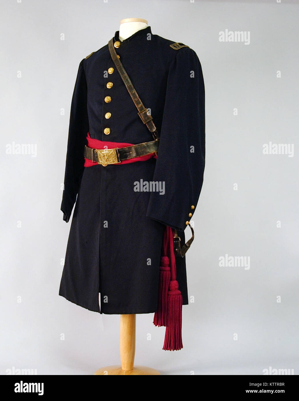 This is a Civil War officers coat and sash worn by Capt Waters Braman