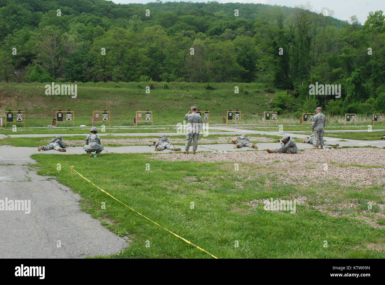 CAMP SMITH-- National Guard Soldiers from across the northeast engage targets during the rifle marksmanship competition of the Northeastern States Best Warrior Competition held on Wednesday, May 16 at Camp Smith Training Site. Soldiers and Non-Commissioned National Guard Soldiers from across New England, New York, and New Jersey are competiting to represent the region in a national competition later this year. Stock Photo