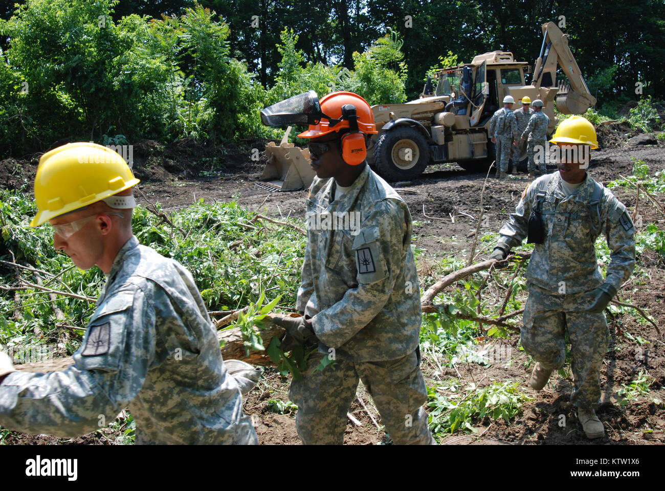 COHOES, N.Y. - Soldiers from New York Army National Guard's 1156th Engineer Battalion and 152nd Engineer Company leveled trees and removed tons of underbrush in the ruins of the Erie Canal located in the center of the City of Cohoes on June 11 as part of a trail-clearing process. The Soldiers were conducting innovative readiness training as part of their Annual Training.  Photo by Sgt. 1st Class Steven Petibone, New York Army National Guard Stock Photo