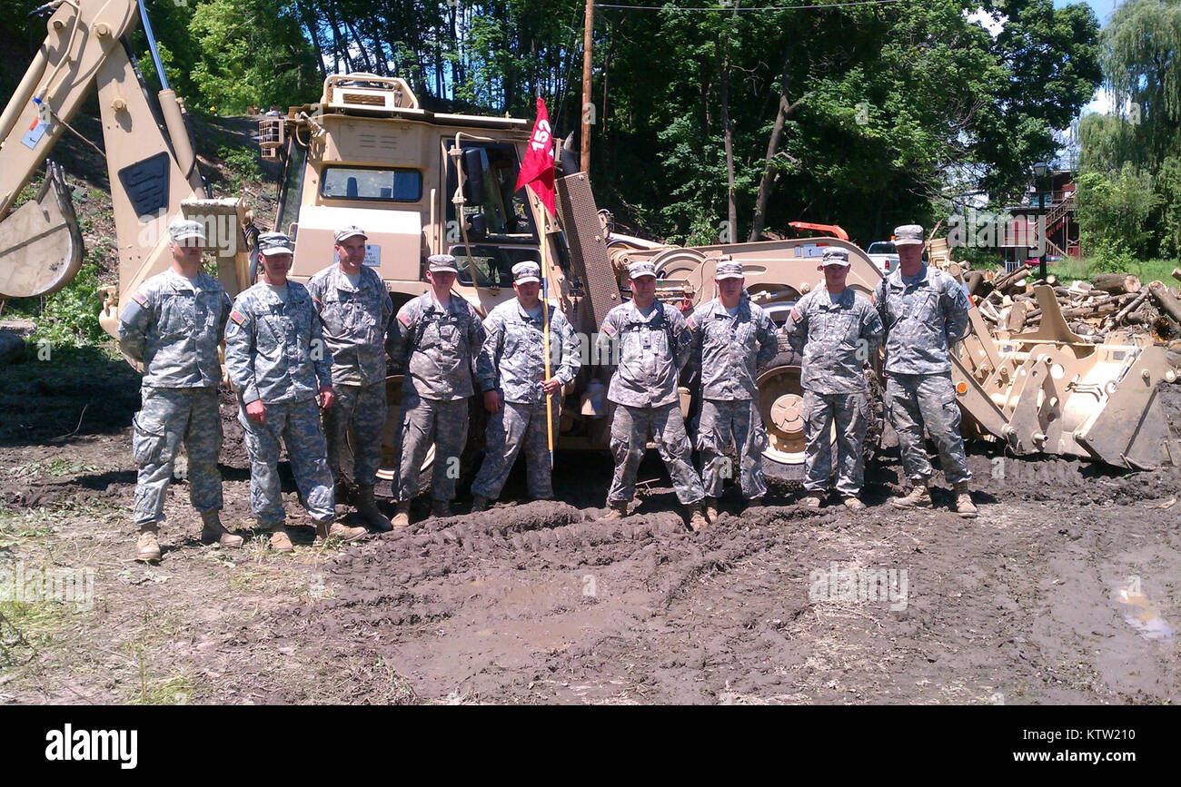 Soldiers from the 152nd Engineer Company who worked on the project in Cohoes--clearning part of the old Erie Canal for a park-- pose for a photo. They are: (From left to right) PFC Klotzbach, SGT Edwards, SPC Liley, PFC McCaslin, SPC Hibsch, SPC Olds, SPC Lucas, PFC Singleton,  and PFC Connors Stock Photo