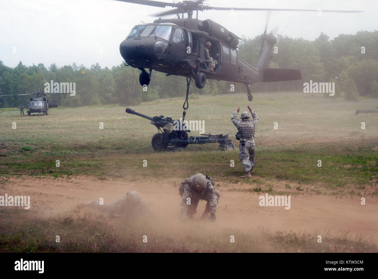 Soldiers Of Battery B, 1st Battalion, 258th Field Artillery Wait For ...