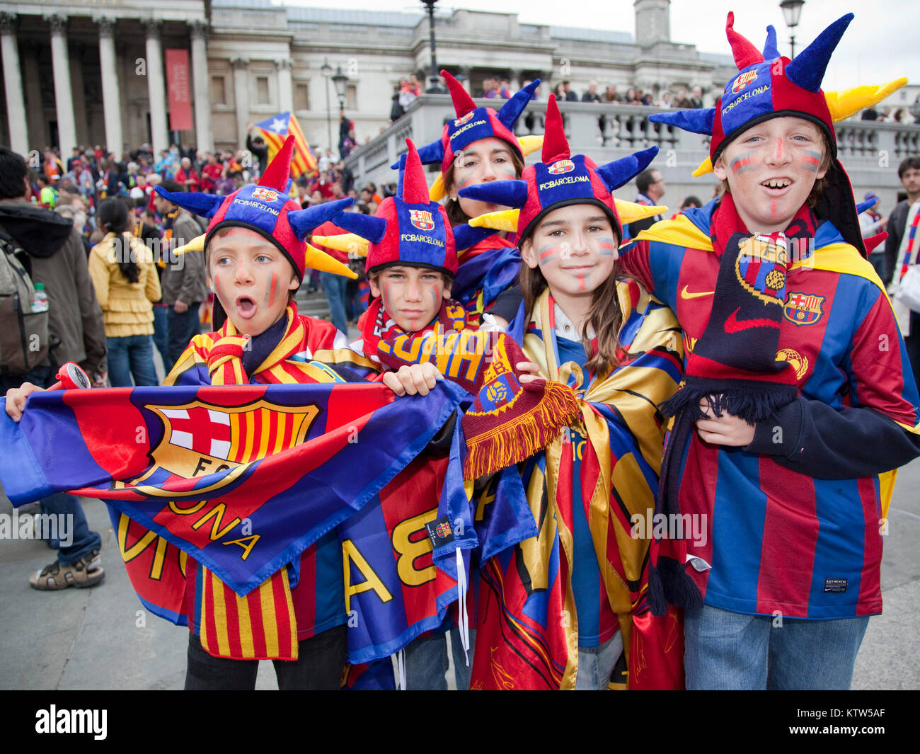 Friendly Barca fans in Trafalgar Square before the kick-off of the Champions League Final between FC Barcelona and Manchester United. Young fans. Stock Photo