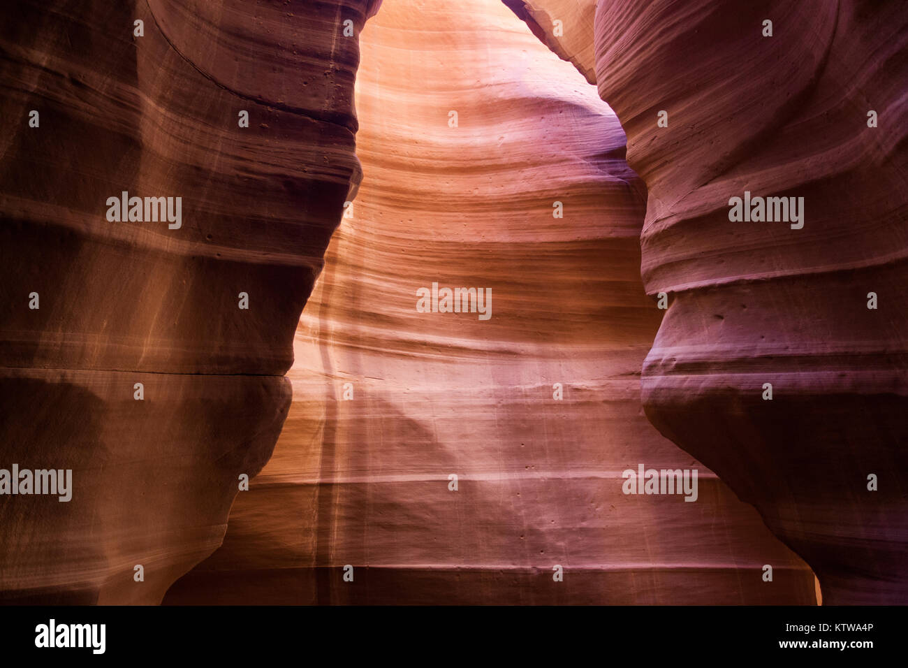 PAGE, ARIZONA, USA. - APRIL 2015: A light ray breaks thru an opening in Antelope Canyon. Stock Photo