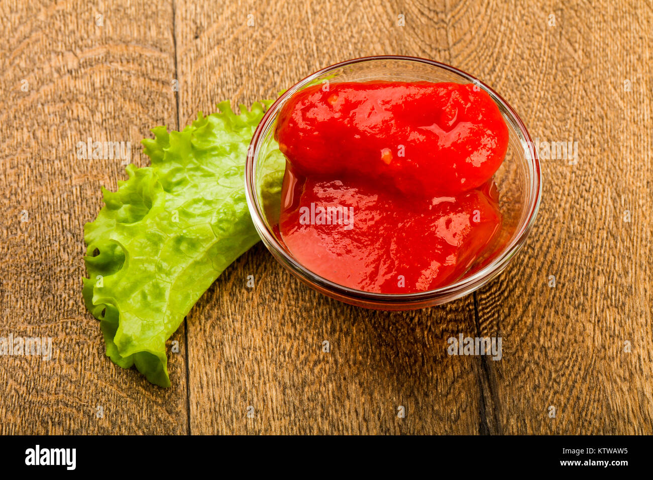 Peeled tomatoes with juice in the bowl Stock Photo Alamy