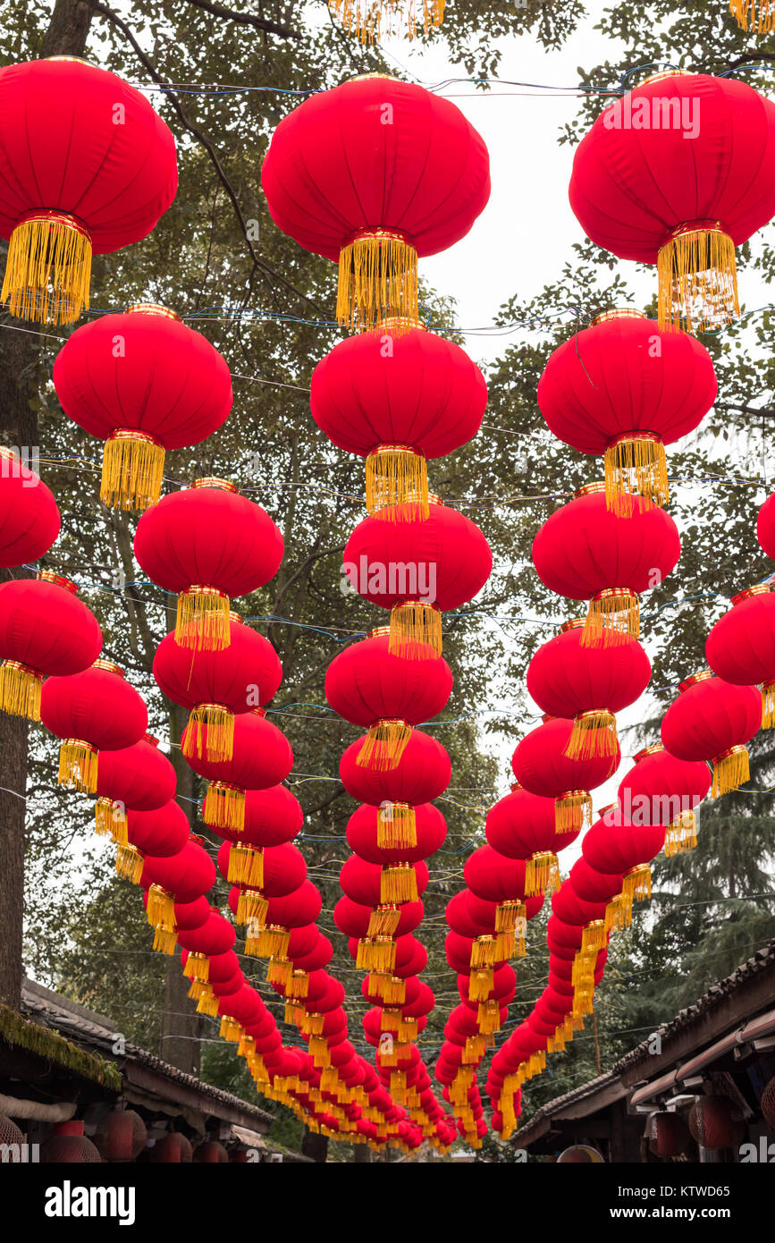 Rows of red chinese lanterns hanging in a street Stock Photo - Alamy