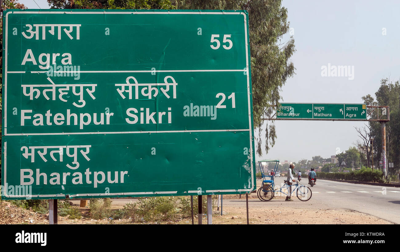 Indian road signs on the highway between Jaipur and Agra, India Stock Photo