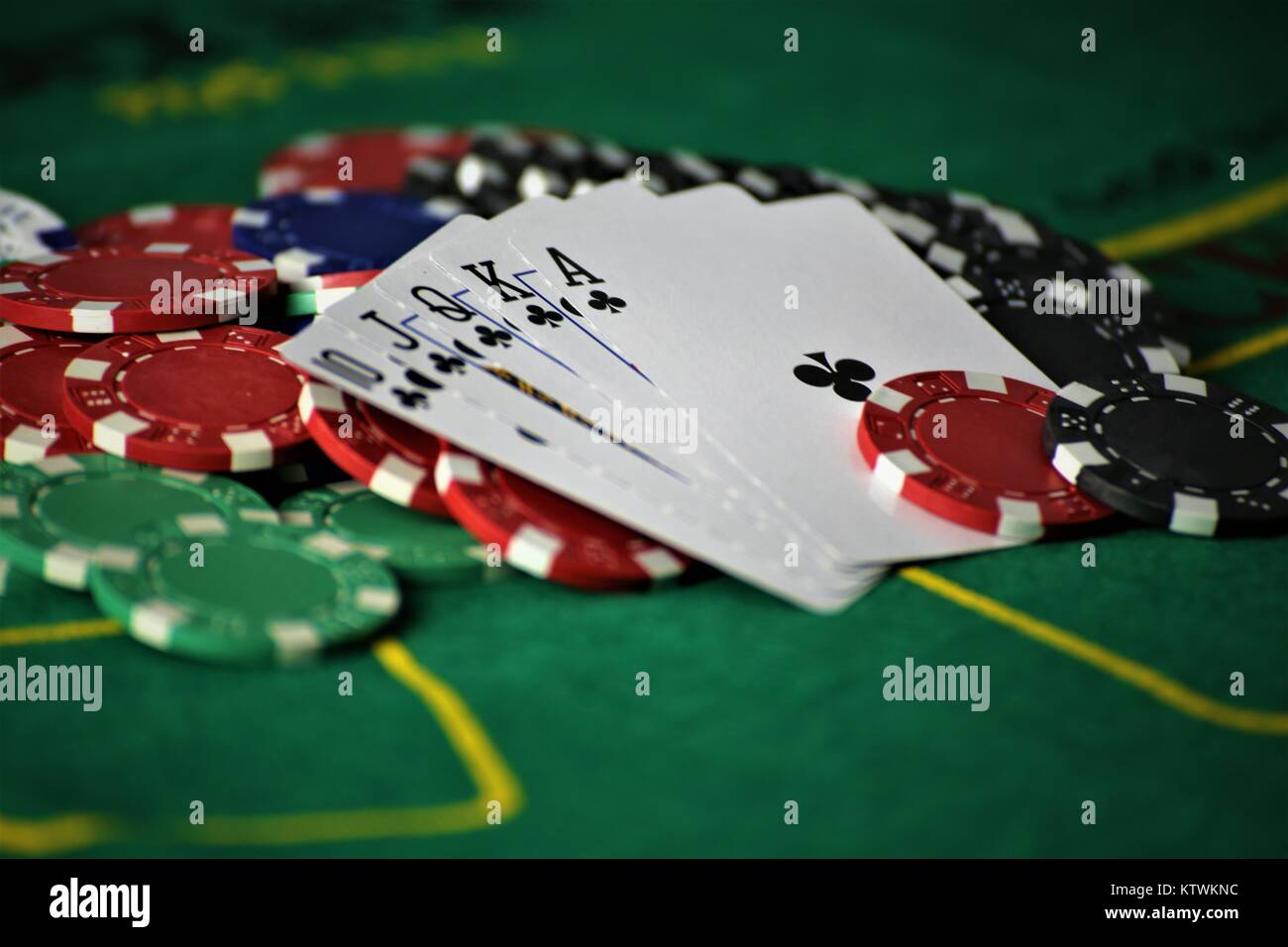 Poker chips on green felt poker table Stock Photo by ©gcpics 4347541